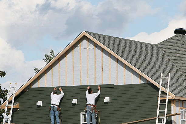 Professional Siding technician working in North Bend, PA